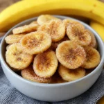 Crispy Cinnamon Sugar Air Fryer Banana Chips in a serving bowl
