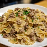 Creamy Garlic Parmesan Beef Pasta served warm in a skillet