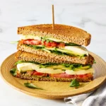 Fresh cucumber caprese sandwich with mozzarella and balsamic glaze
