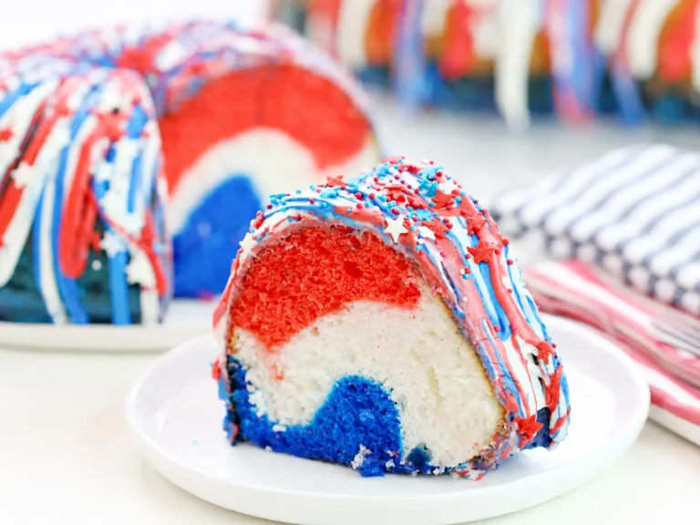 Colorful Firecracker Cake with red white and blue frosting drizzle
