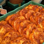 Freshly baked French Toast Casserole with cinnamon topping in baking dish
