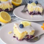Lemon Blueberry Sheet Cake topped with fresh lemon glaze and blueberries