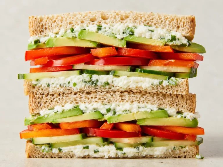 Cucumber Avocado Sandwich with avocado, cucumber, and creamy cheese spread on toasted whole-wheat bread