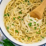 Creamy Garlic Pasta served with Parmesan cheese and fresh parsley