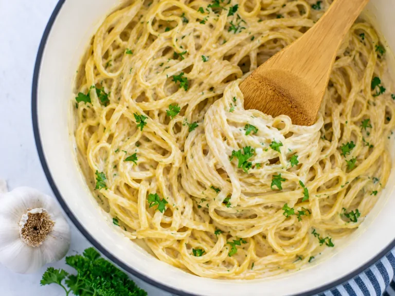 Creamy Garlic Pasta served with Parmesan cheese and fresh parsley