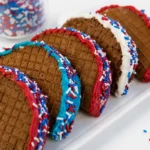Patriotic Chocolate Tacos filled with ice cream and festive sprinkles