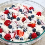 Red White and Blue Cheesecake Salad with fresh berries and creamy cheesecake dressing