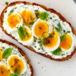 Smashed Egg Toast topped with herby lemon yogurt and soft eggs