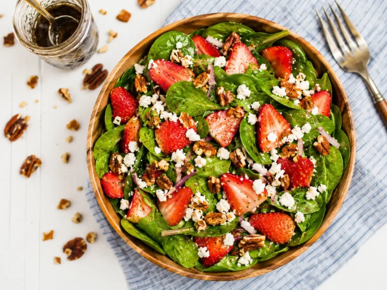 Spinach & Strawberry Meal-Prep Salad with chicken, feta, and walnuts in meal-prep containers