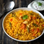 Tomato Rice One Pot Meal served hot with coriander and cashews