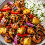 Hawaiian Chicken Sheet Pan with roasted pineapple, peppers, and glazed chicken