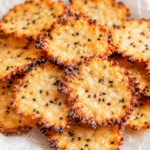 Freshly baked High-Protein Cottage Cheese Chips with everything bagel seasoning on a serving plate
