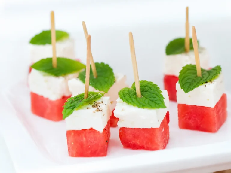 Watermelon Feta Skewers with mint and feta on a summer platter